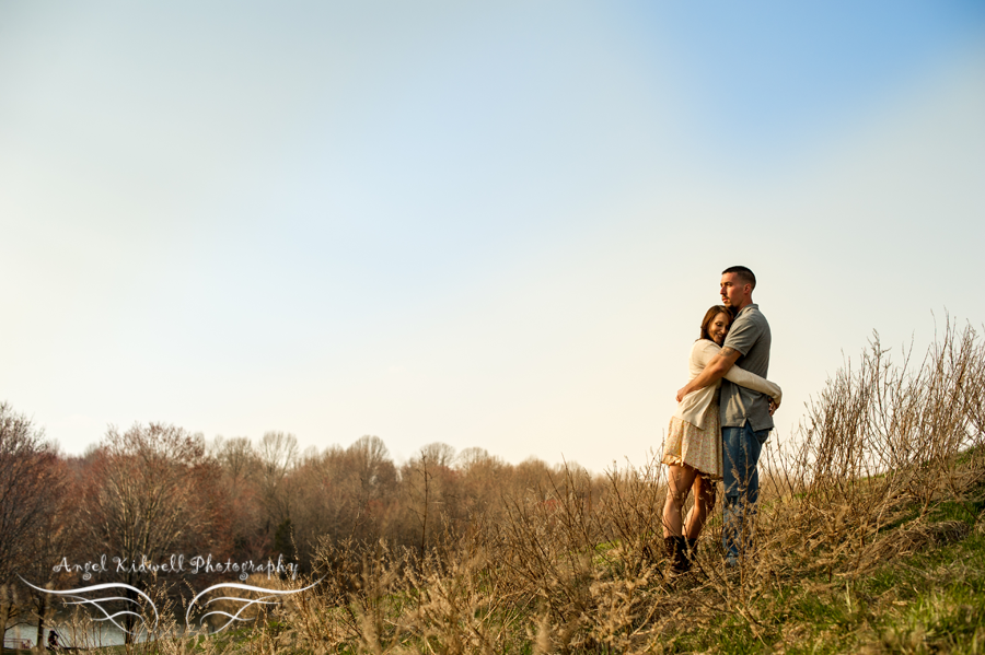 columbia maryland engagement photographer, centennial park engagement session, columbia maryland wedding photographer, pasadena maryland wedding photographer, dramatic picture of a couple on a hill