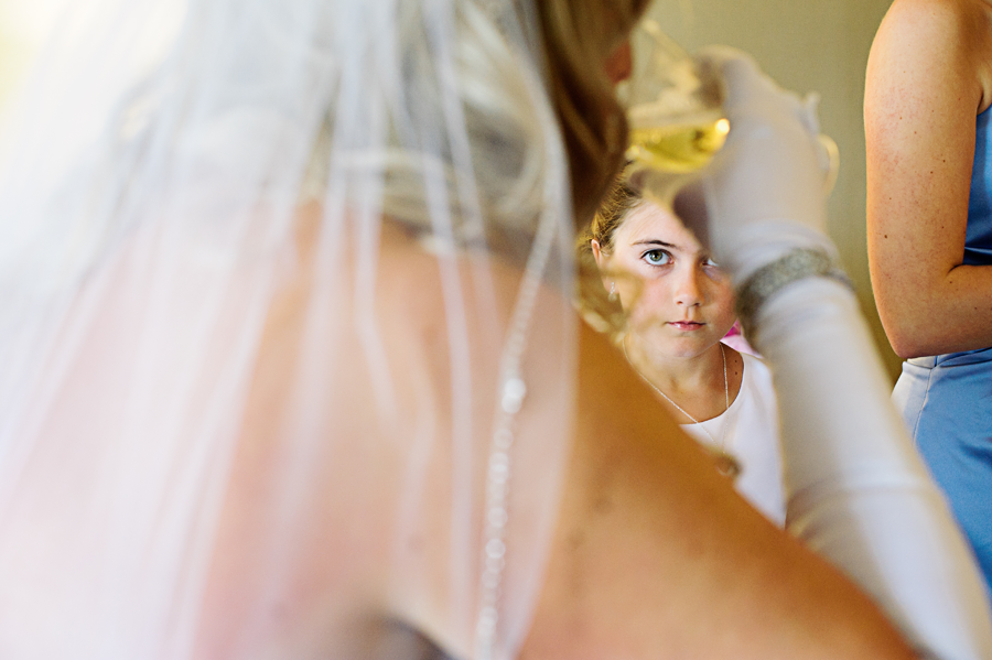 Flowergirl watching Bride