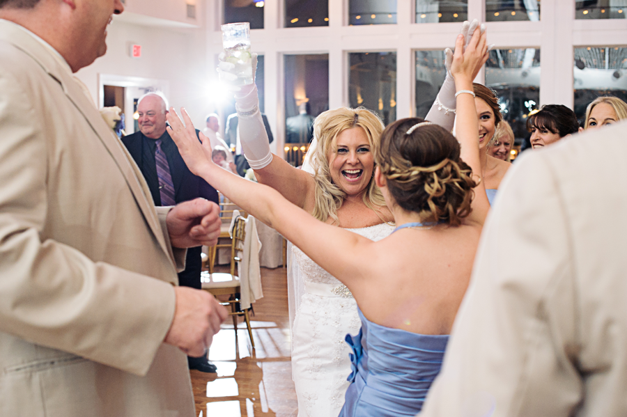 bride with bridesmaid cheering