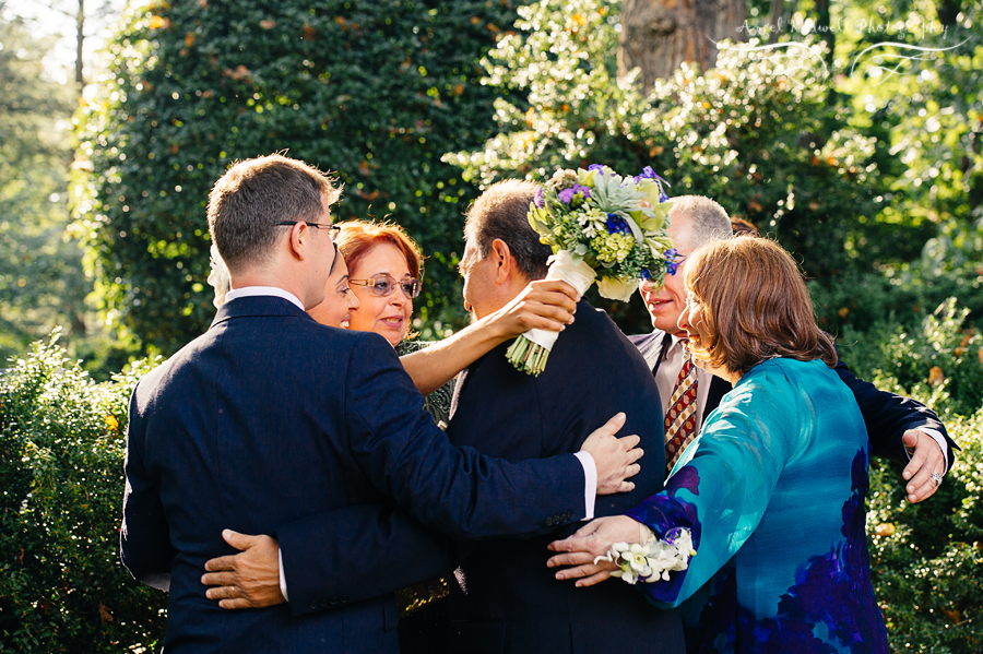 family embracing after a wedding ceremony at Tudor Place