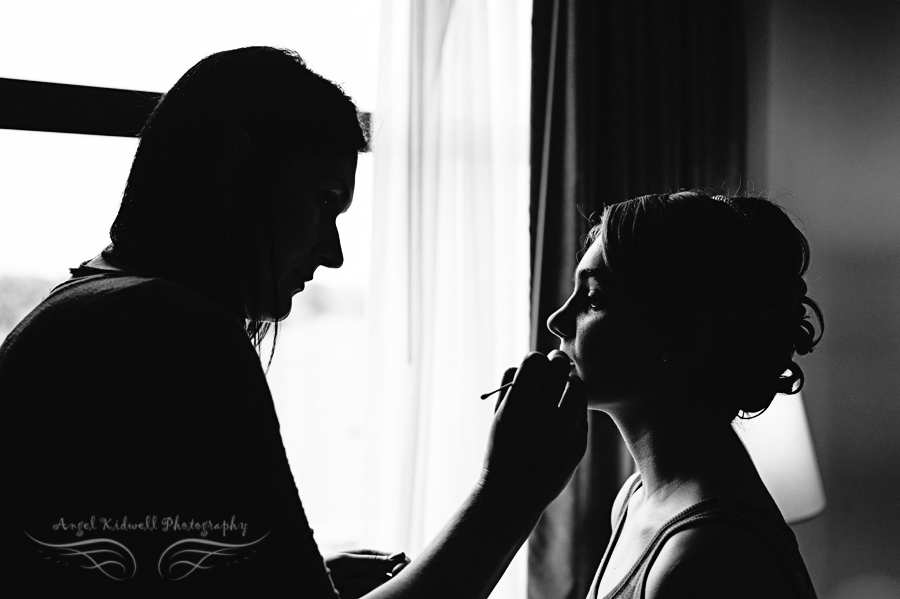 bridesmaid getting her makeup done in baltimore