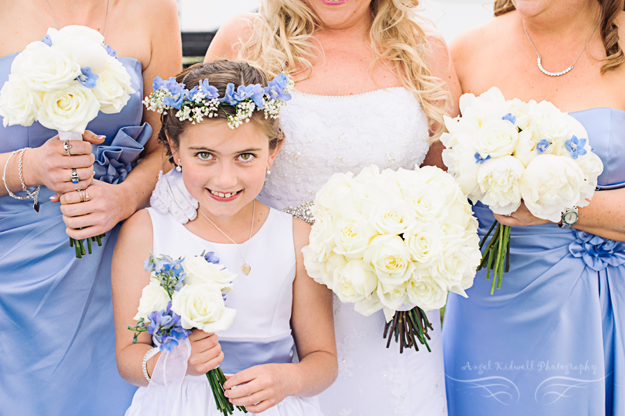 flower girl with a flower hair wreath at celebrations at the bay