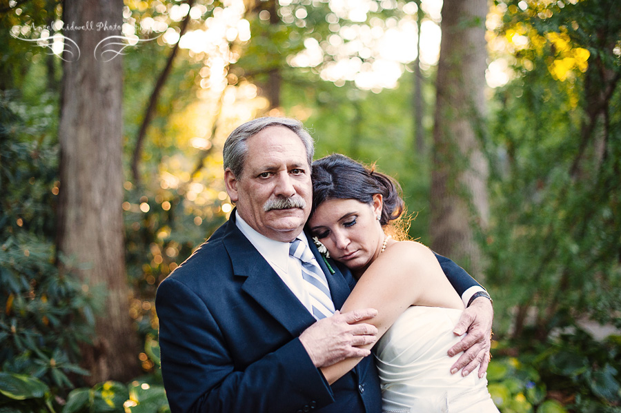 bride hugging her father at after a wedding ceremony at the gramercy mansion
