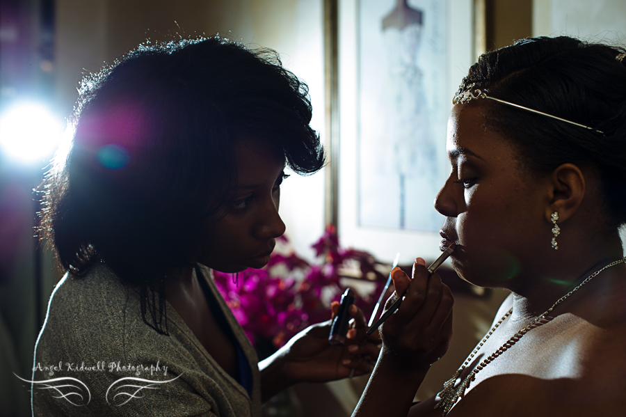 bride getting her makeup done in baltimore