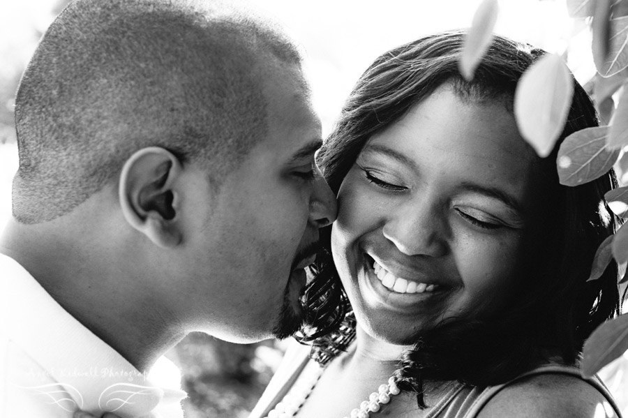 urban baltimore engagement photographers groom kissing brides cheeck