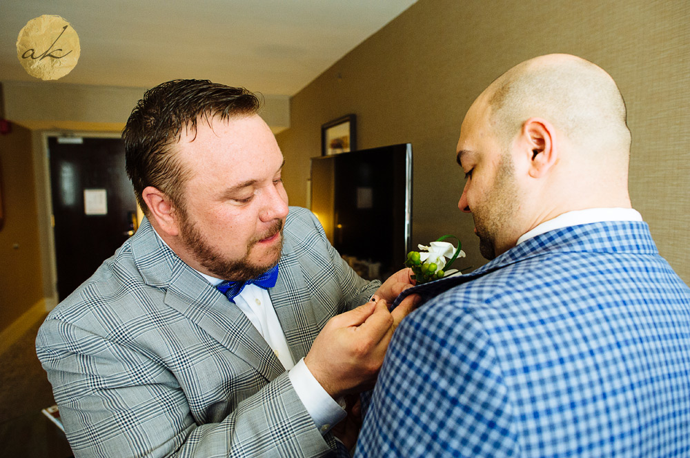 same sex couple getting ready on wedding day