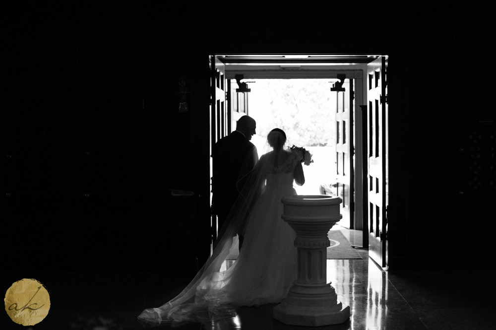 bride and groom exit church atSunset room National harbor wedding
