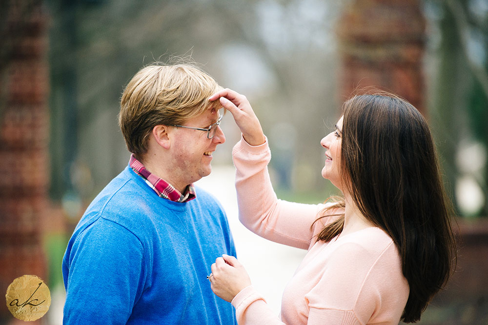 maryland spring engagement photos women fixing mans hair