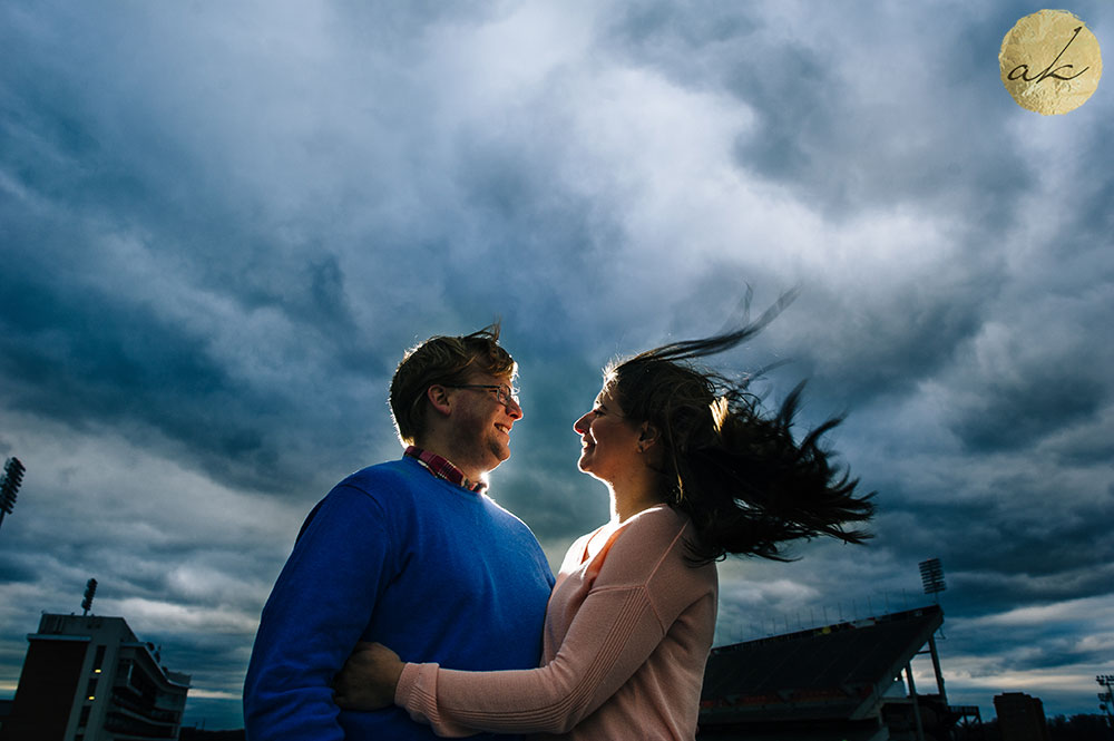 university of maryland spring engagement session couple under a stormy sky