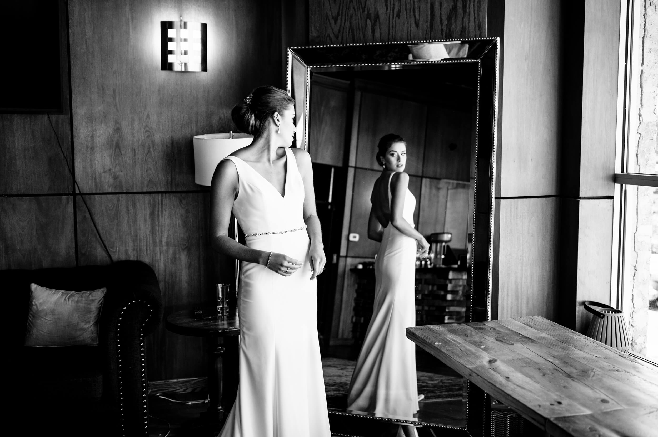 bride getting dressed at washington dc wedding venue