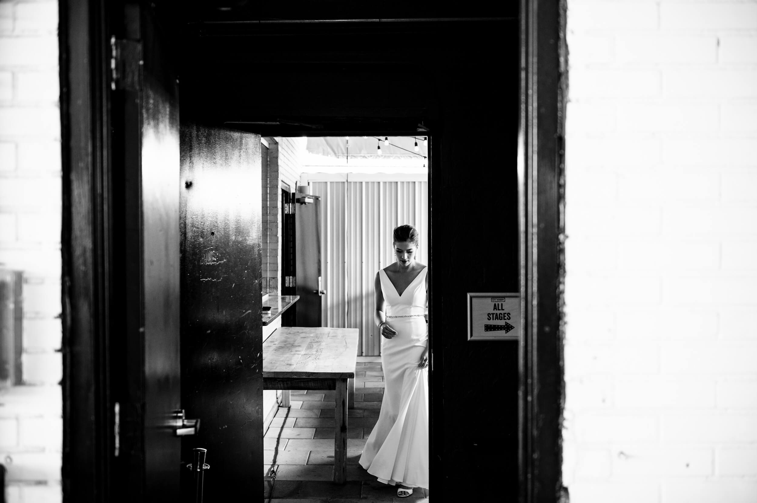 bride walking to groom for a first look at washington dc winery wedding venue