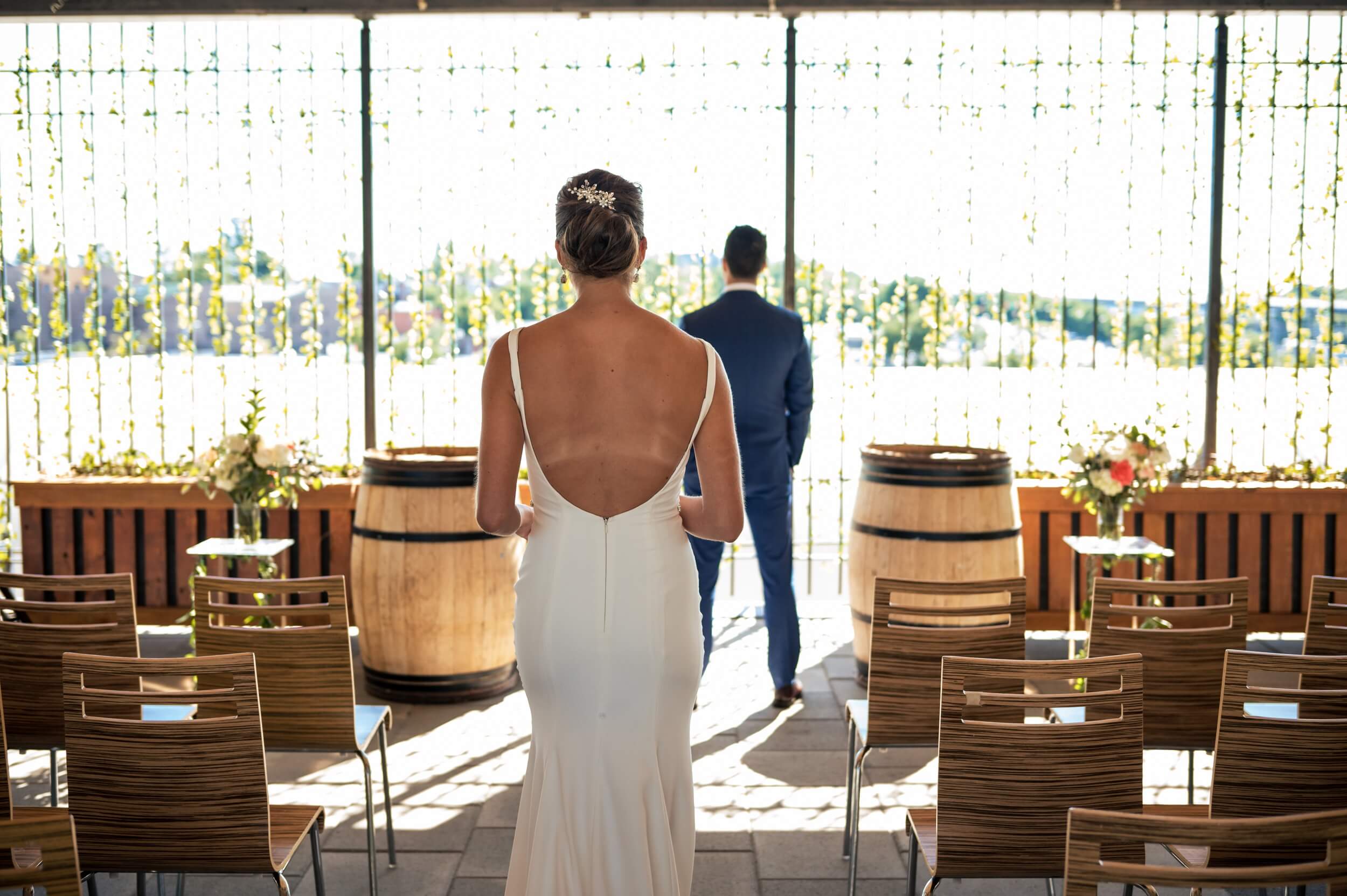 bride walking to groom for a first look at washington dc winery wedding venue