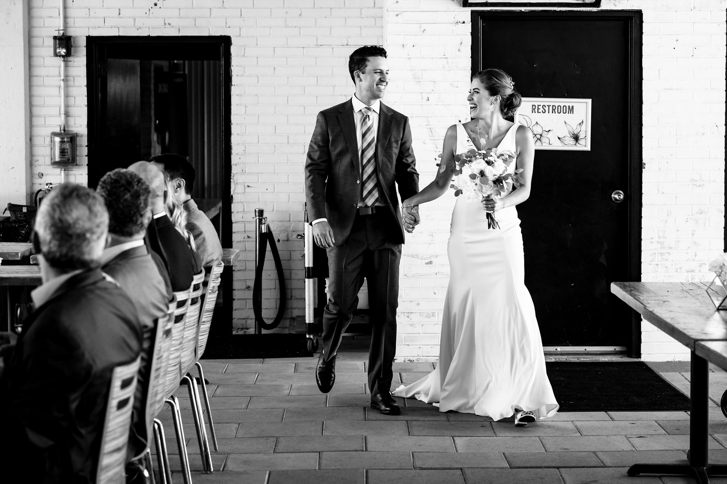 bride and groom laughing at washington dc wedding ceremony