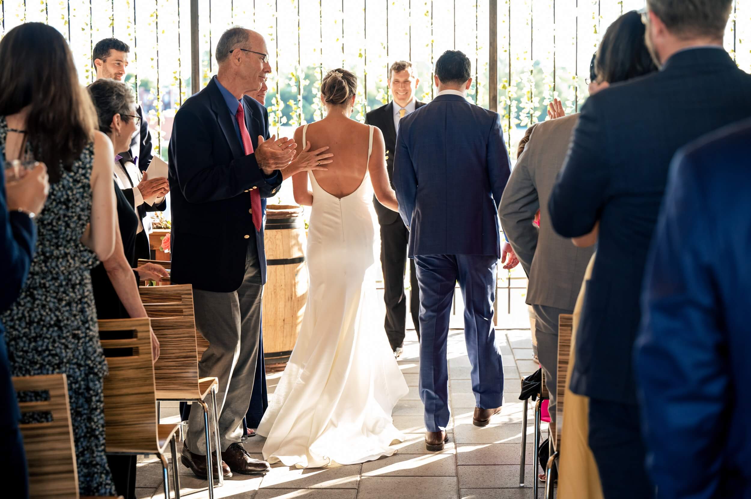 couple walking up aisle for ceremony