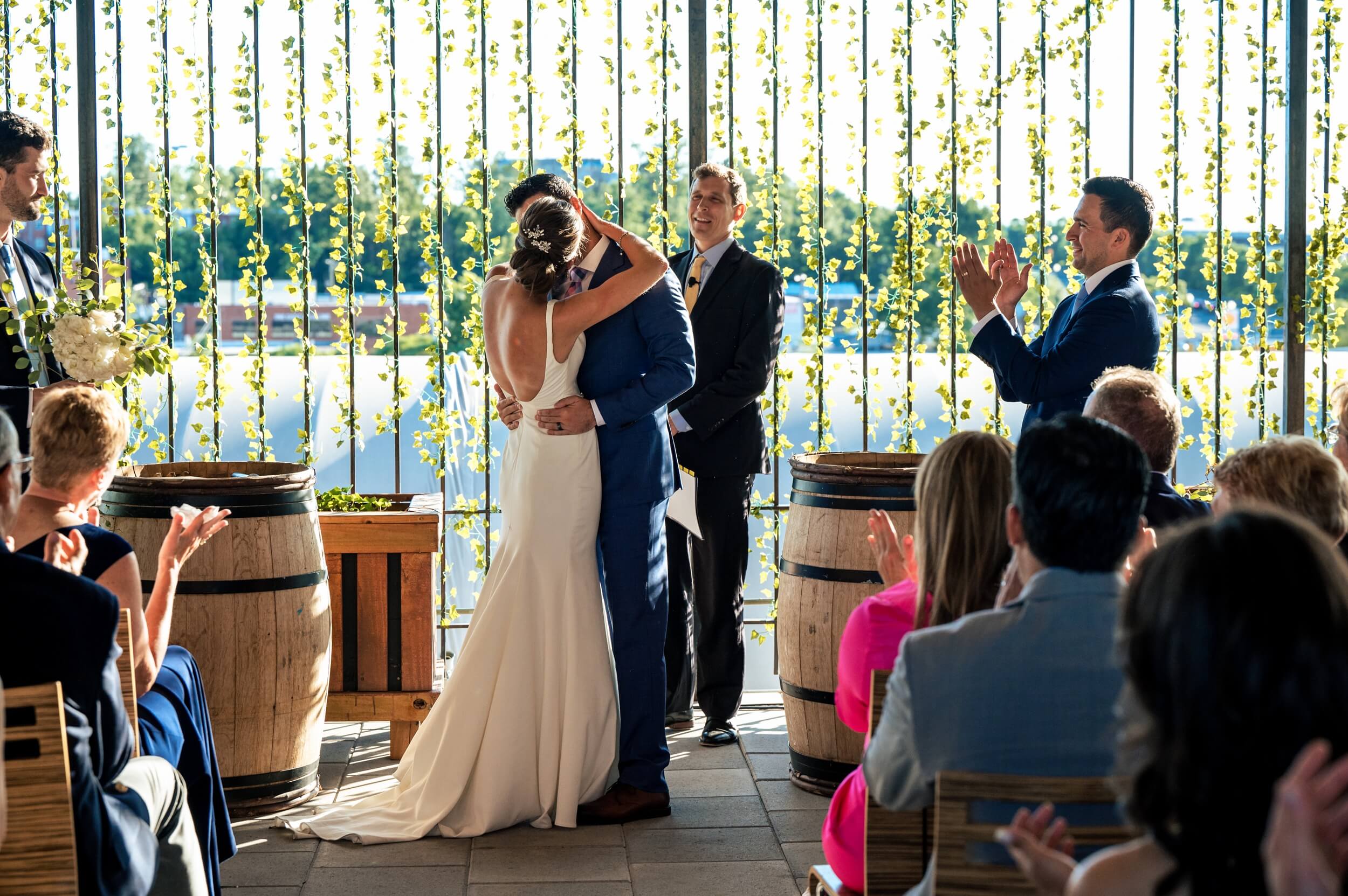 first kiss of bride and groom at city winery in washington dc