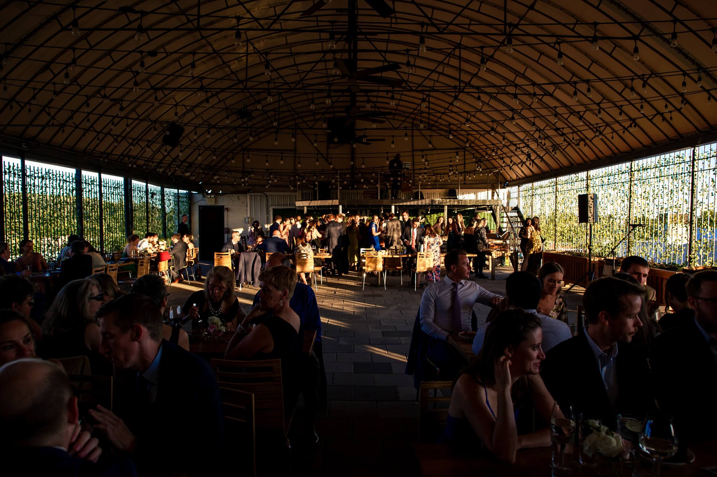 whole room photo of washington dc winery wedding venue during sunset