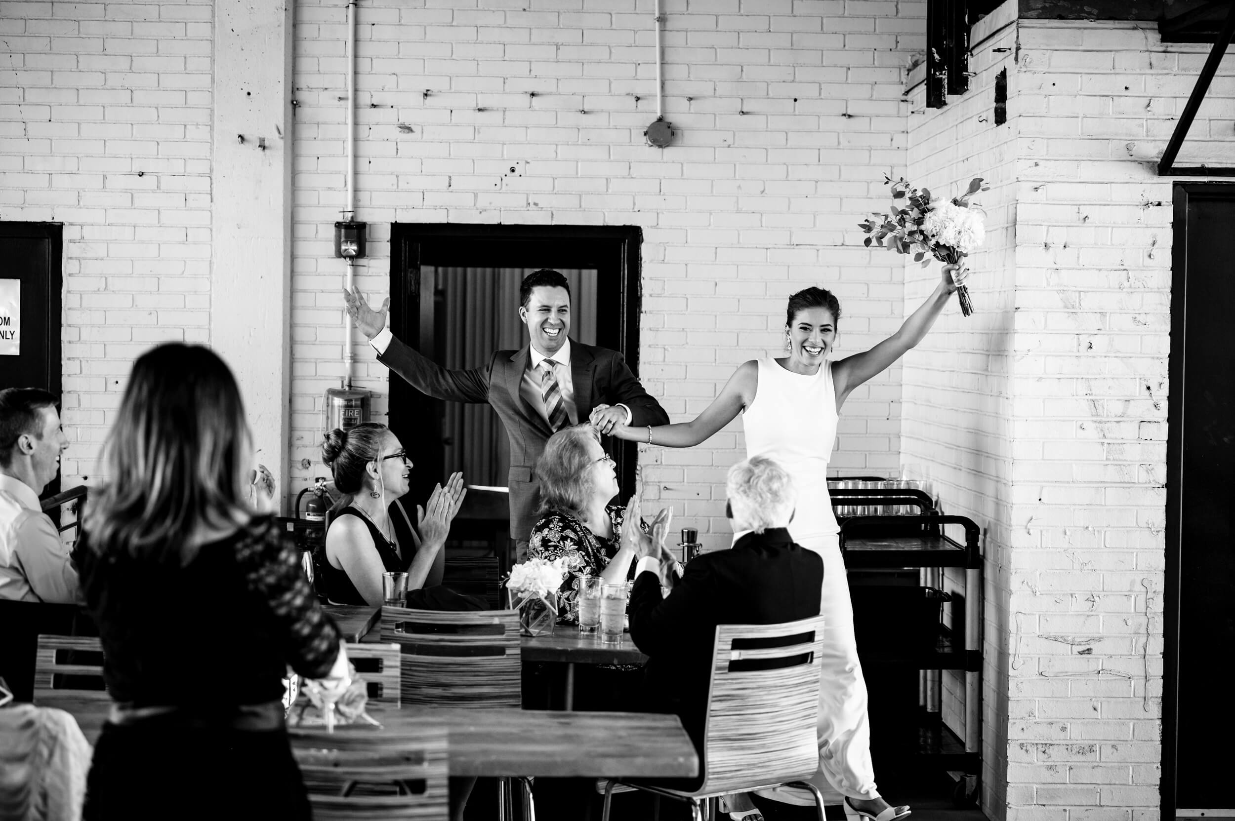 just married couple entering the reception rooftop room of winery wedding venue in washington dc