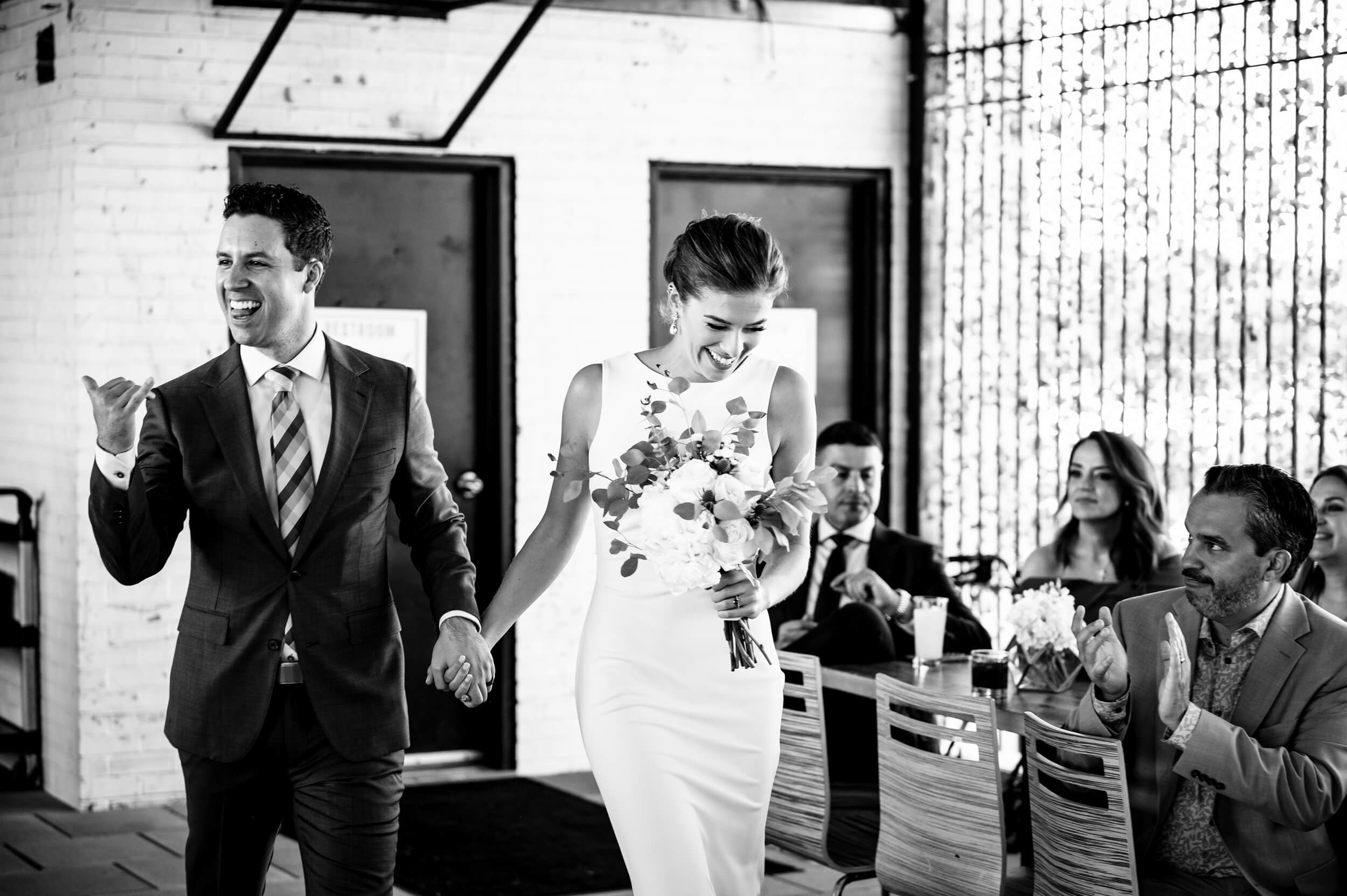 just married couple entering the reception rooftop room of winery wedding venue in washington dc